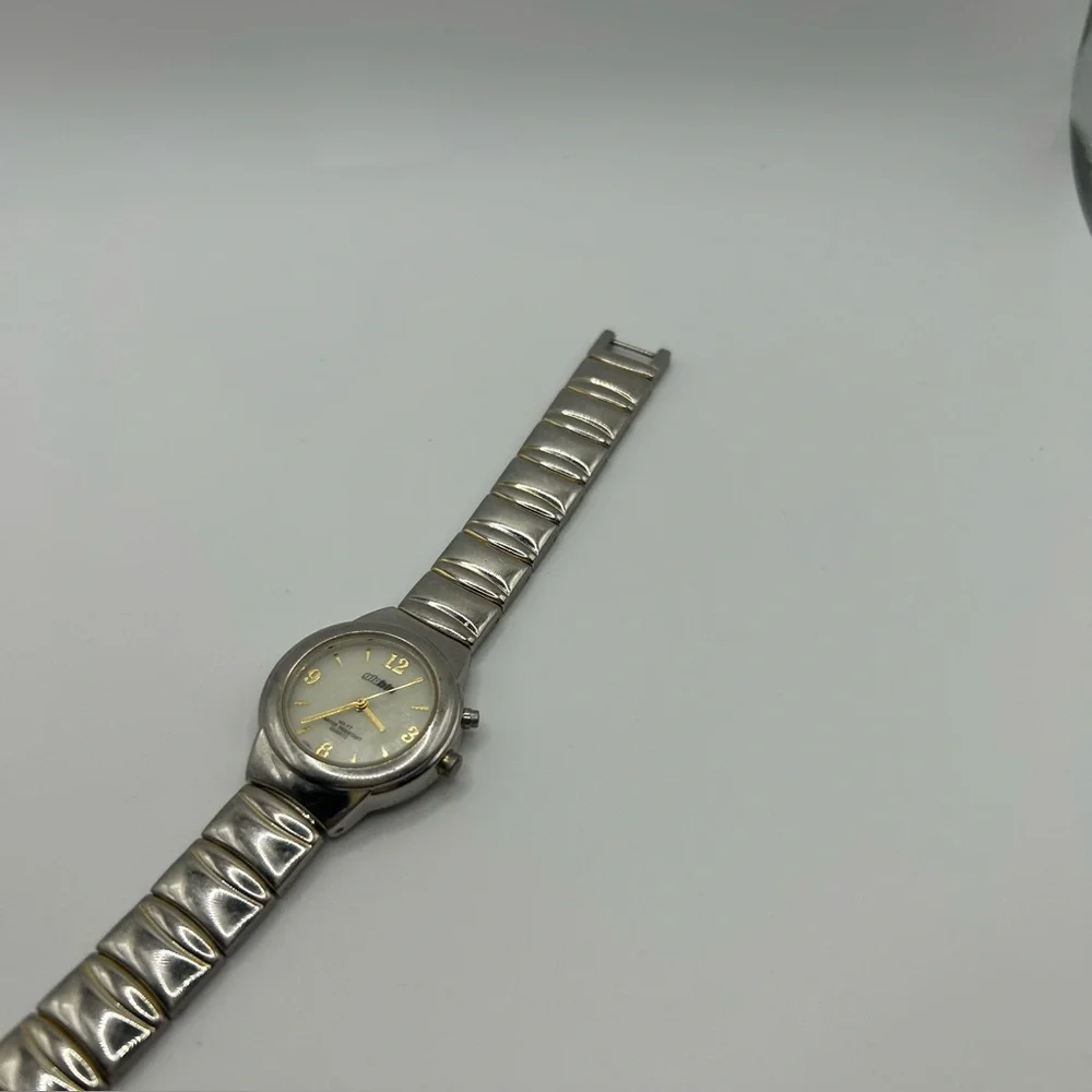 VTG GoBlu Illuminating Wristwatch Round White Face Silver & Gold Tone Band